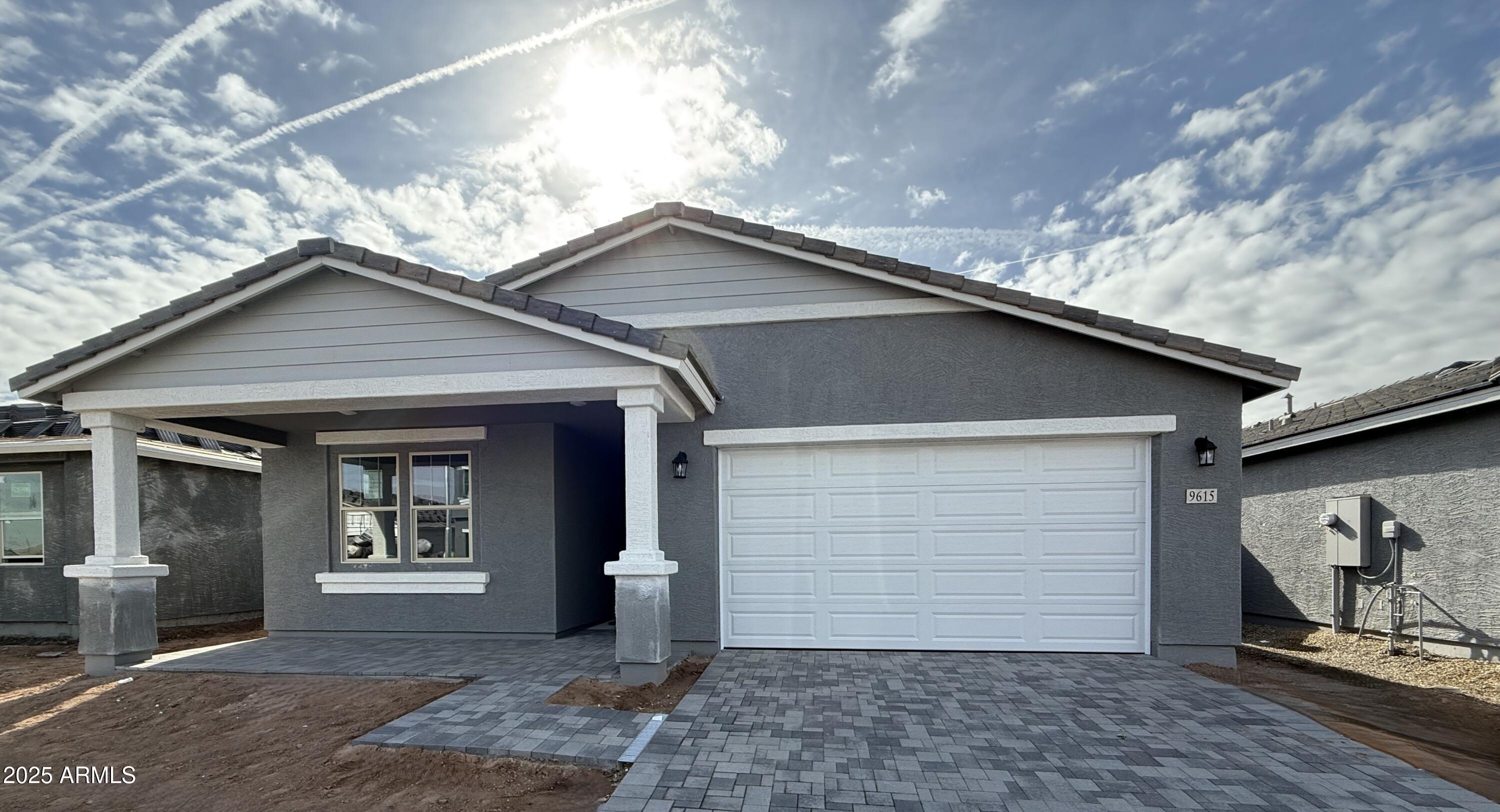 9615 W TAMARISK Avenue