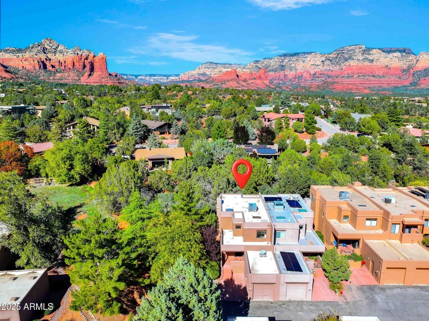 Easy & bright, West Sedona, lock & leave 3 bedroom townhome. Central location less than two minutes from Whole Foods, restaurants, trailheads and parks, with an abundance of quiet, backing to greenspace!! Private end unit, with green space to Left and Back of property. Unit has front patio, back patio, with upstairs & balcony that both catch Red Rock views of Thunder Mountain and Bryns Mesa. Freshly painted, ample natural light from skylights & end unit windows, plus extra storage with large pantry and single car garage. Multiple upgrades that cover new appliances & more, nicely maintained, with community pool & HOA that covers water, trash, roads, clubhouse, pool, ins. policy. See home improvements list in documents tab.