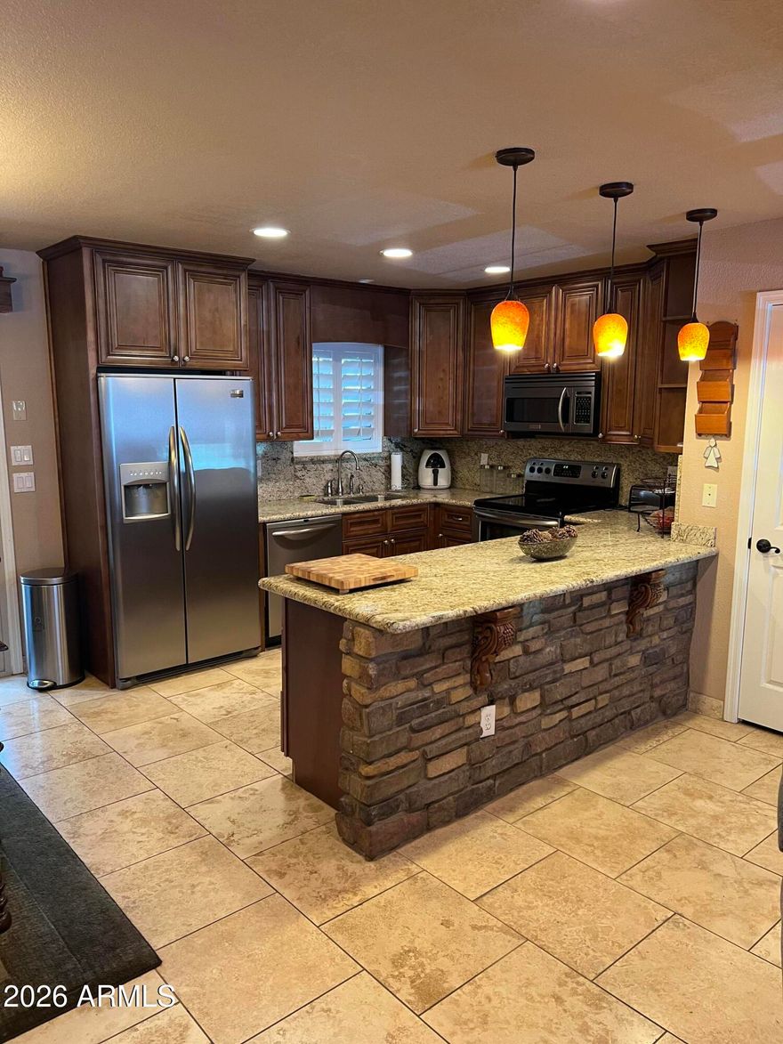 Fully updated 3 bedroom. 2 1/2 bath unit within the peaceful gated community of Country Pines. Home features travertine flooring, 42'' cabinets, granite countertops, newer carpet and heating system. Quiet community that features, a community pool, and gym. This is a must see and will not disappoint.