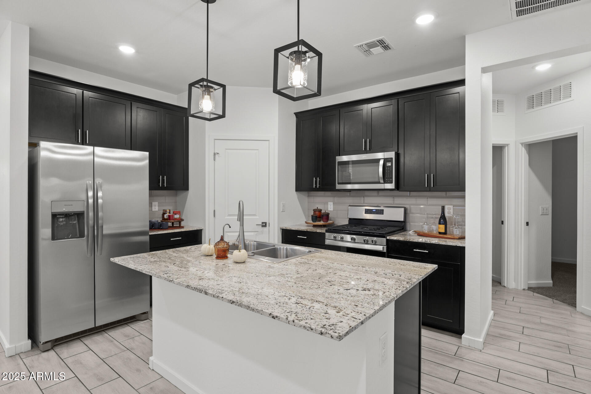 14178 W VOLTAIRE Street