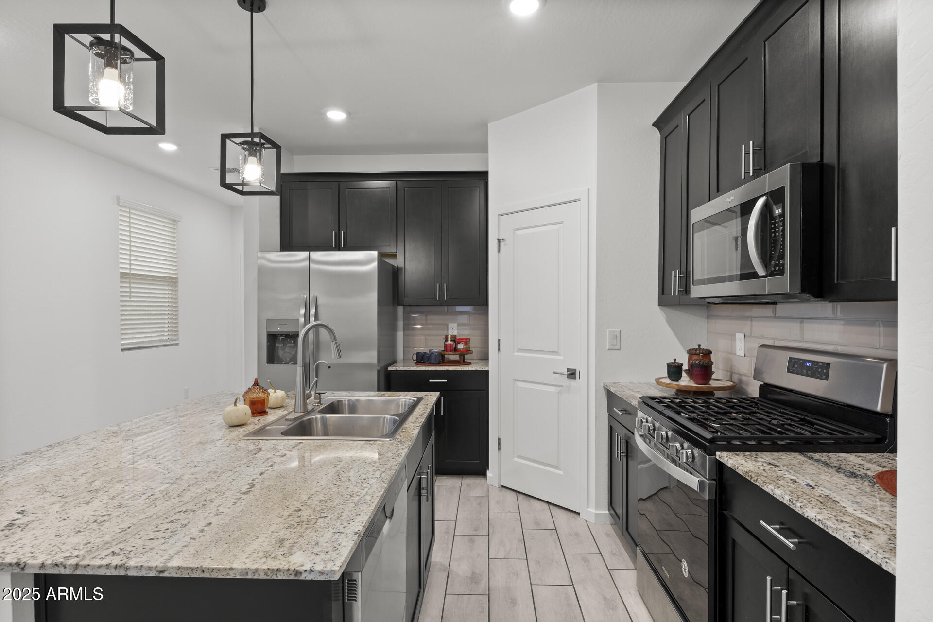 14178 W VOLTAIRE Street