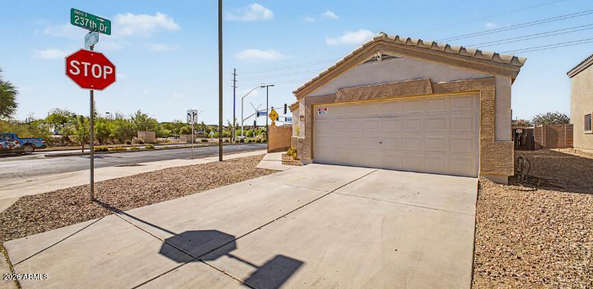 23765 W DESERT BLOOM Street