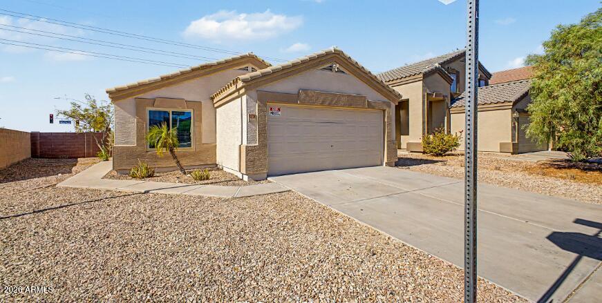 23765 W DESERT BLOOM Street