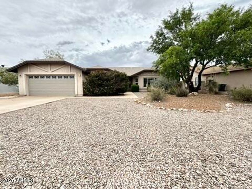 Welcome to this inviting Sierra Vista home featuring a pool and spa, perfect for enjoying Arizona living year-round, all situated on a generously sized lot near the golf course. The beautiful backyard offers a large swimming pool, spacious covered patio, fire pit, grass area, and a storage shed--ideal for relaxing or entertaining. Inside, the home is filled with natural light and open spaces, highlighted by a beautiful gas fireplace, along with a functional layout and a newer dishwasher already in place. Conveniently located near local amenities, this home combines comfort, location, and lifestyle. The owner may consider a VA loan assumption for eligible VA buyers, offering an attractive 2.9% interest rate.
