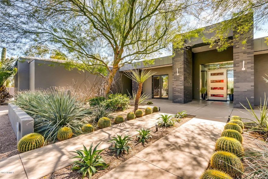 One of a Kind! Chic contemporary home built for a family & entertaining! Main House boasts 6,375 sq ft: 4 bdrms+Office+Exercise rm. 4.5 baths. 4 car garage. All BRs are ensuite w/ walk-in closets. Bright & sunny open floor plan. Sleek gourmet kitchen w/ Zebra wood cabinets, Ceasar Stone counters,stainless steel backsplash, & Wolf/Subzero appliances that's open to large family rm w/ fireplace. Split floor plan w/ master & office plus bonus rm on kids wing. Home features include:Glass pocket doors for indoor/outdoor living, porcelain tile,Italian light fixtures, high ceilings, Bang & Olufsen audio/ visual. Master bdrm & bath w/ oversized his/her closets, indoor & outdoor showers w/ pebble finish. Resort like backyard w/ firepits,heated lap pool & spa.  Separate 484 sq ft guest house in back.