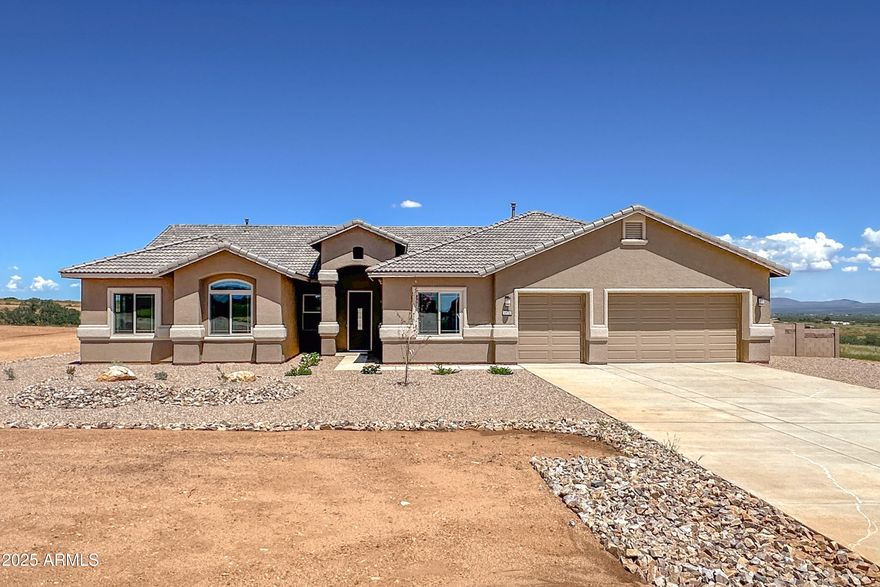 Beautiful 5BD/2.5BA, 2971 sqft 3-car garage new construction home on a 3acre lot in the desirable Kings Ranch community in Hereford! Kitchen features 42'' upper cabinets, soft close doors/drawers, pull out trash & pot drawers, granite countertops, tile backsplash, 36'' gas cooktop, stainless appliances including micro/wall oven, and island. Wood-look tile flooring throughout living areas. Split plan, master suite features tiled 9'x3.5' walk-in shower with seat & niche. Baths feature executive height soft close vanities, granite counters & undermount rectangle sinks. Environments for Living Guaranteed & HERS Rated Home.