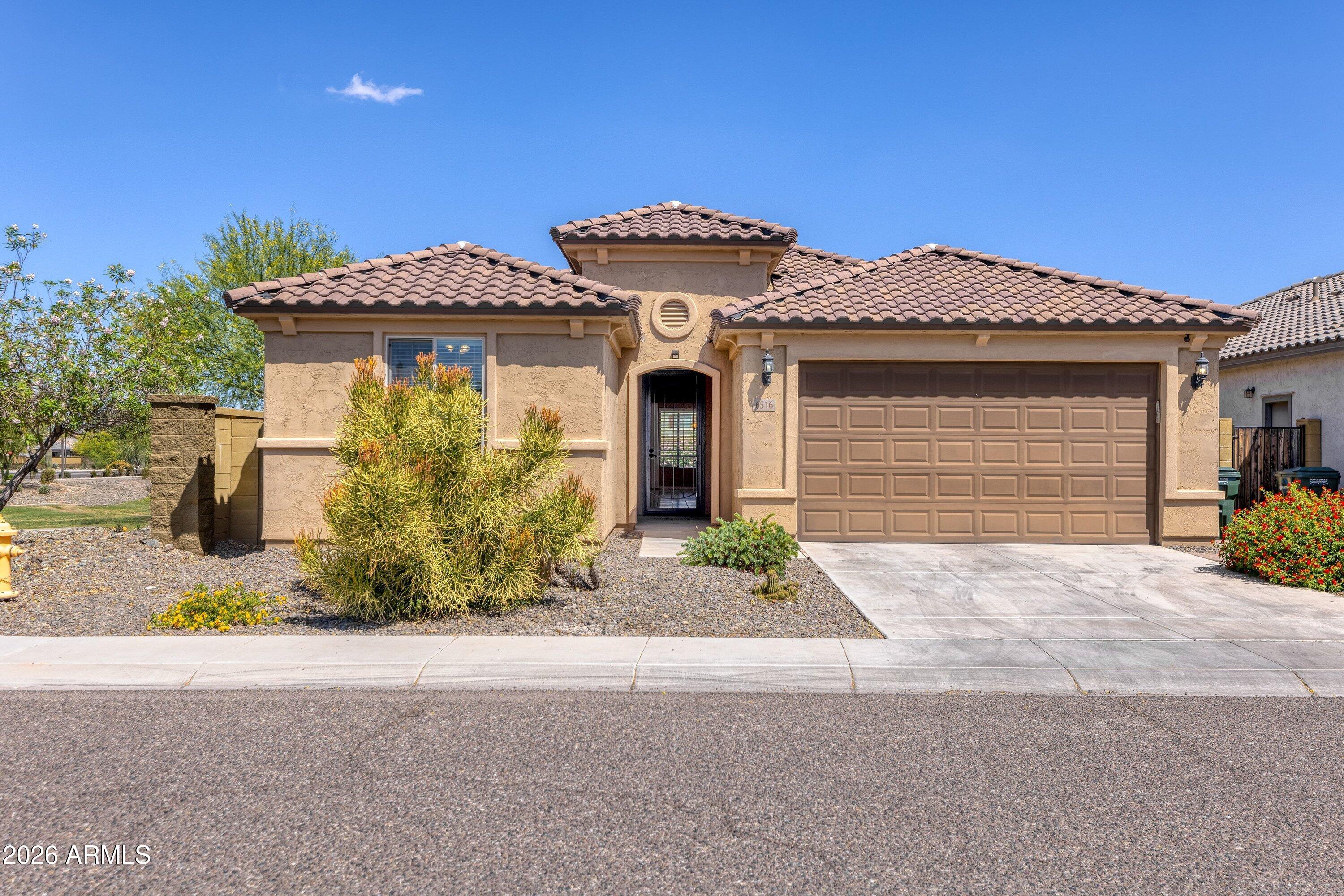 6516 W MADRE DEL ORO Drive