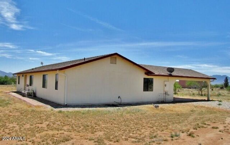 This 3BR/2BA/2CG, 1469 sq.ft. home on 4 acres of horse property in Hereford, AZ in near Sierra Vista, AZ and Ft. Huachuca, AZ. The home includes a large, open living area, central A/C and 4 acres of fenced horse property. Call today.