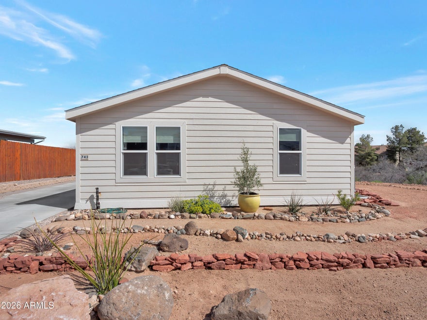 Welcome to this beautiful 2024 manufactured home where you own the land, NO lot lease. This home is perfectly positioned on an extra-large corner lot with stunning views of Mingus Mountain. Thoughtfully designed with upgraded finishes, the home features new flooring, fresh paint, and a bright, modern interior that feels both stylish and comfortable.
The three-bedroom, two-bath layout offers a functional floor plan with open living spaces that flow easily for everyday living and entertaining. The kitchen and living areas feel light and inviting, while the bedrooms provide comfortable retreats with ample space.
Outside, the oversized lot creates a rare opportunity to design the outdoor environment exactly how you envision it. With room to add custom landscaping, a carport, or a garage, this property offers the perfect canvas for someone ready to put their personal touch on the space.
Whether you're looking for a newer home with modern finishes or a property where you can create a truly personalized outdoor setting, this Mesquite Springs home offers both comfort and potential -- all while enjoying beautiful Mingus Mountain views