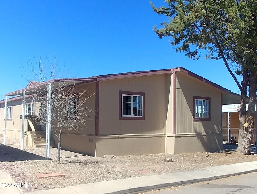 Newly remodeled! Spacious, open floorplan concept, split bedroom, 3 Bedroom, 2 full bath. Awnings front and rear. Roomy shed included. Chain link fence in small area.
ALL NEW..... hard surface Flooring through out, Cabinets, Counter tops, Refrigerator, Gas oven/range, Dishwasher, upgraded Bathrooms, Plumbing, Roof, Air Conditioner, Furnace (gas), Water heater (gas). Located in a wonderful gated community. 2 Heated Community pools (one indoor), Spa, 2 Club Houses.