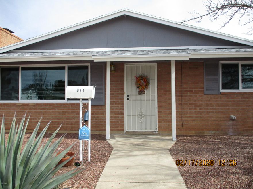 This home is full of charm and pride of ownership! Located centrally in Sierra Vista on a corner lot and plenty of privacy. From the minute you walk up to the front door you will be able to see yourself living here. The main living room has a wood burning fireplace with an antique mantel and built in shelving for all your family pictures and decor. Throughout the home you will find character along with plenty of space for all your needs. The kitchen is open and bright with a nice tile back splash and seating for conversation. Not only does this home have what you need inside, but the private backyard has been very well taken care of and feels like an oasis. More upgrades throughout the home and a roof that is only 2 yrs old. You DO NOT want to miss the opportunity to call this HOME!!