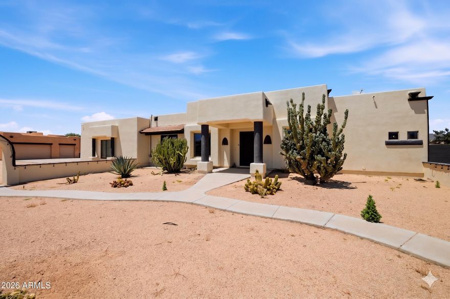 CAR LOVERS DREAM ESTATE! This home boasts a NEW roof, NEW AC, NEW water heater, NEW flooring, and has just been NEWLY painted interior & exterior. This stunning Desert Hills property offers a blend of luxury and versatility on a sprawling 1.1-acre lot. The property features a huge 3 car garage attached to main house & HUGE AIR CONDITIONED RV GARAGE with RV hookup attached to guest house. Step into the meticulously crafted custom home with spacious living areas, a chef's kitchen, and a luxurious master suite, ideal for relaxation and entertainment. Need extra space? The guest house with a full kitchen, office, and master retreat is perfect for multi-generational living or rental income. Outside, enjoy the expansive grounds and breathtaking 360 degree views, all surrounded by block walls for privacy and security. Enjoy majestic sunsets in the enchanting backyard, boasting spacious covered patios with pavers. Desert charm, spacious living, and endless possibilities await!