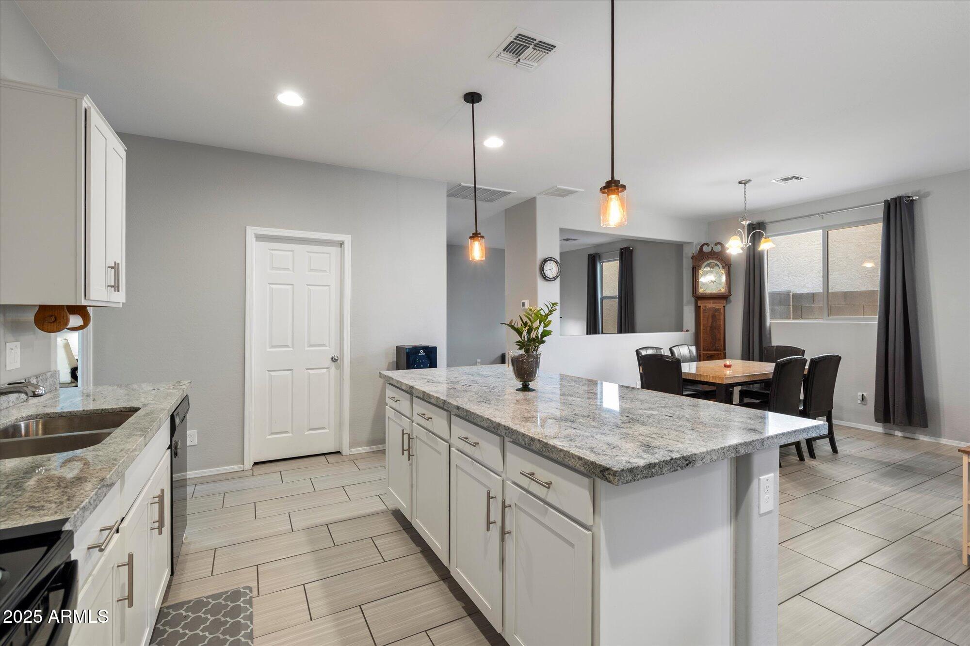 7142 W LAWRENCE Lane