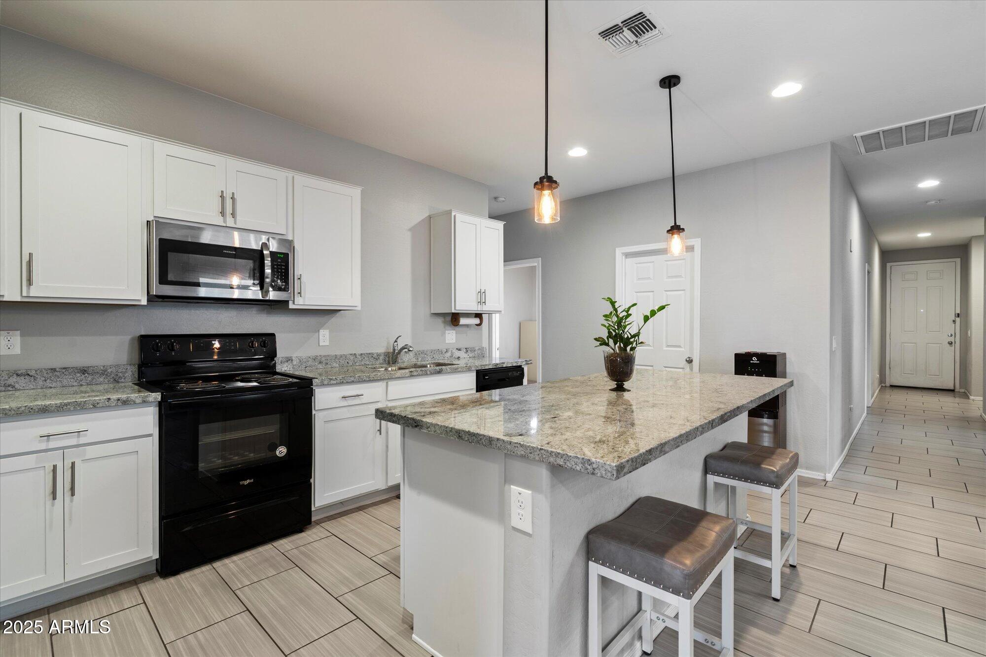 7142 W LAWRENCE Lane