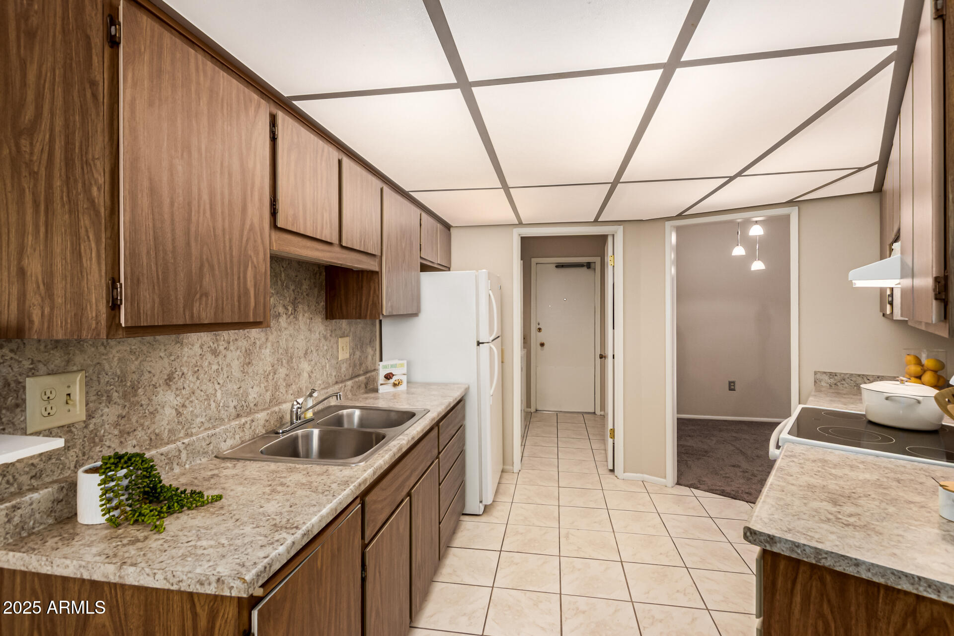 10913 W COGGINS Drive