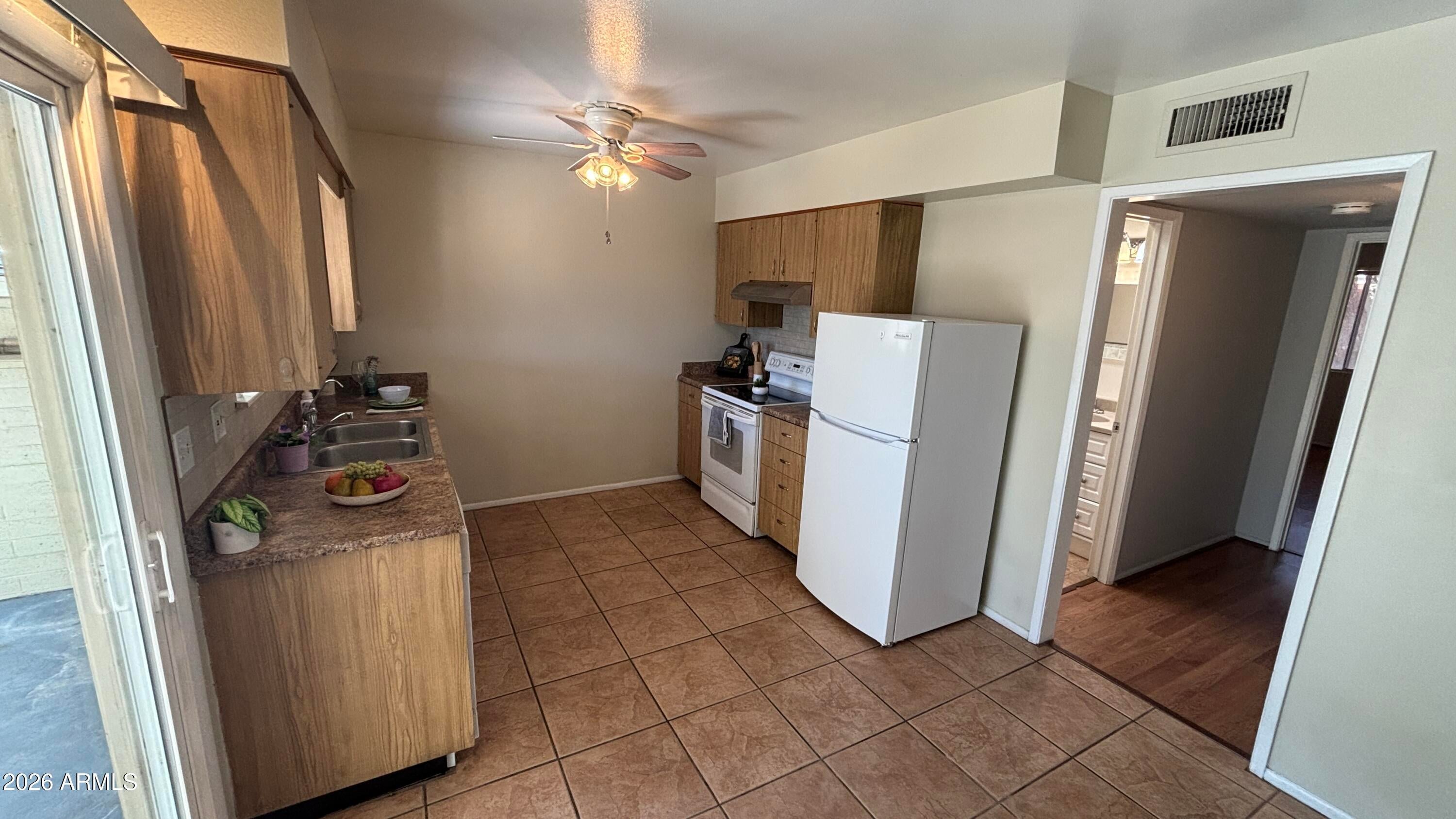 10537 W COGGINS Drive