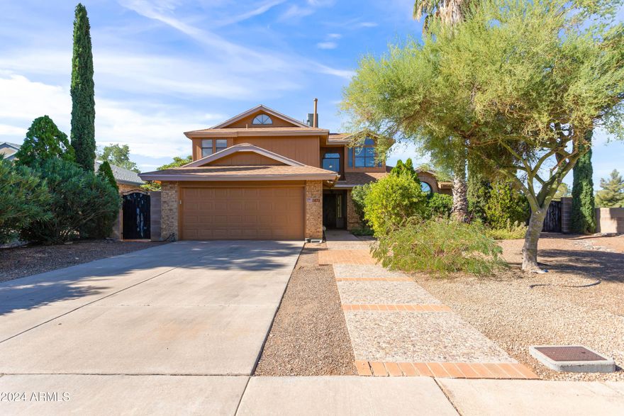 Welcome Home! This unique find is waiting for you. 4 bedrooms - Master bedroom being completely private on the upstairs level alone and 2-bathroom home is just special.  A 4th bedroom could be used as just that or a great bonus room for whatever your needs are, with a closet but also access to the backyard, the use possibility is endless. Main house has a spacious living room open to the kitchen and dining area. Then you step outside to your private getaway including a private pool and spa. There is still plenty of space in the yard outside the pool area for what your heart desires. Double gate makes for easy access and the south side of the house is like a page from a great novel with cute paths and gorgeous green shrubs and plants. Make this house your HOME today