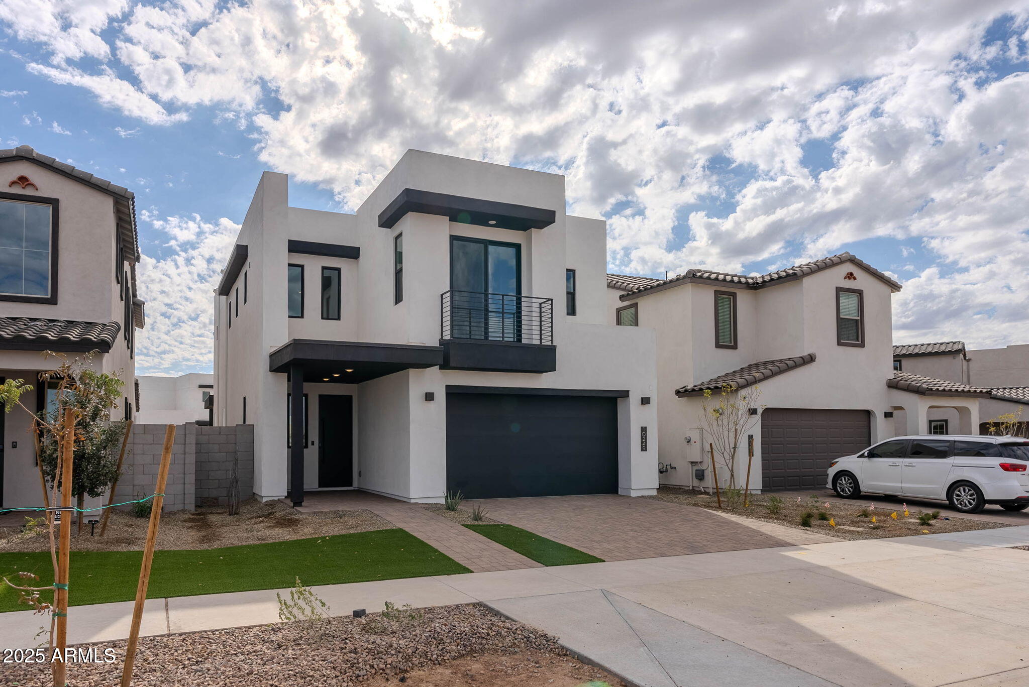 10249 E ULYSSES Avenue