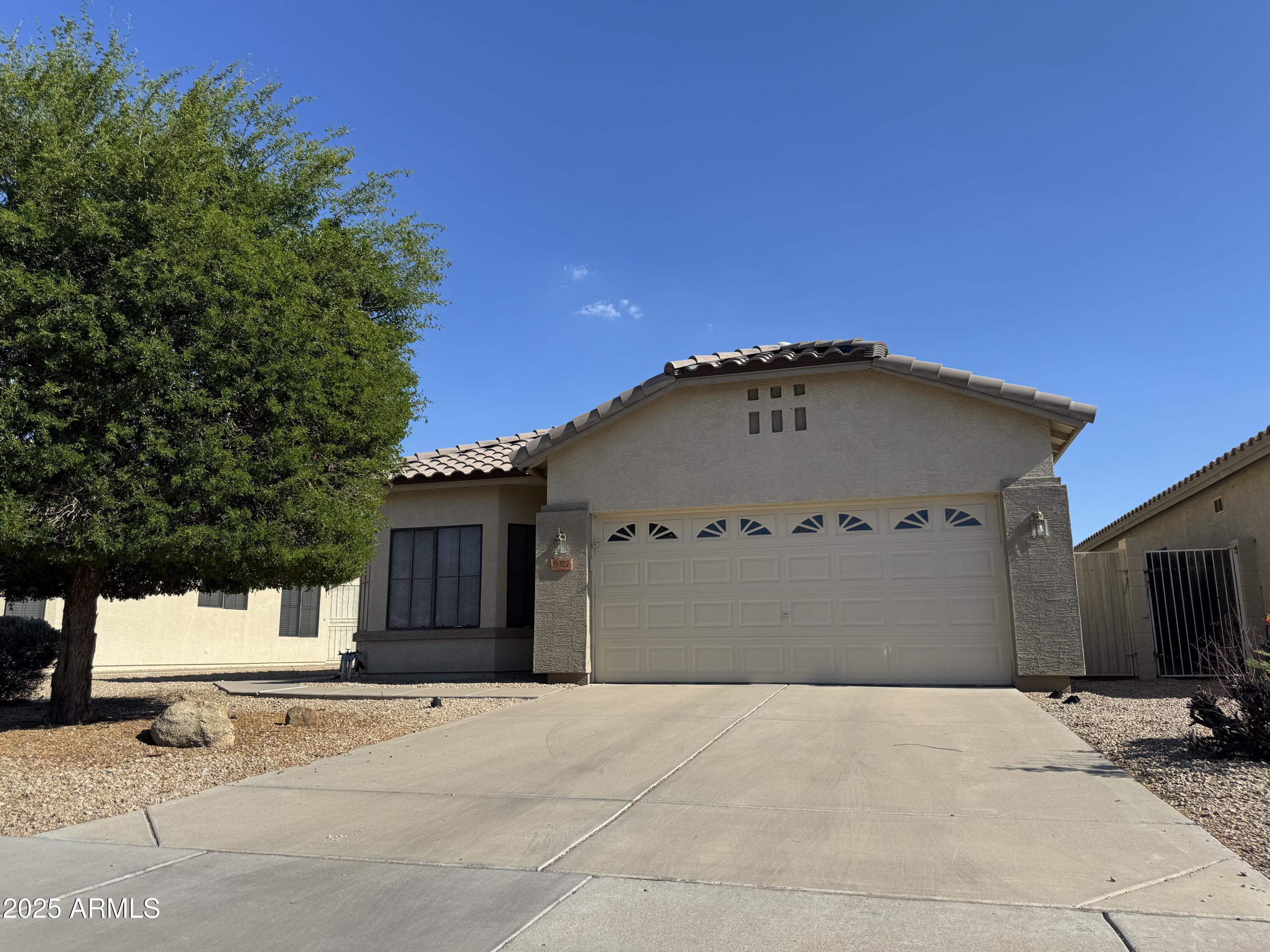 8927 W PARADISE Drive