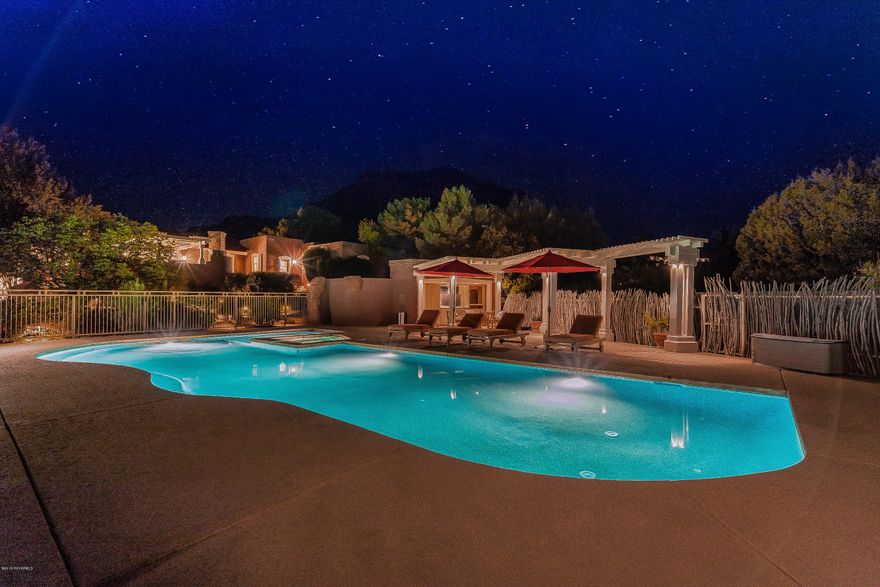 SELLER ready to sell; wants buyer ready to buy this one of a kind private WEST SEDONA Estate loaded w/ all the amenities you would expect at this level!  SELLER WILL CARRY, TRADE For other real estate, Split off separate parcel.  Impossible estate to duplicate with 2 separate street entries: 1 behind GATED Northslopes and the 2nd parcel of 2.5 acres NOT IN AN HOA w/ a paved private road. PRIVATE, Quiet, Extreme VIEWS. Some of the wow features of this home: Cathedral Ceilings, State of the art spa bath, 45 foot heated pool, separate workout casita, Commercial grade kitchen, outdoor kitchen w/ pizza oven, 165'X81' Dressage arena, fully fenced yard, gardens, and garage space to fit 12 cars, heated stables, roomy paddocks, total of 6.84 acres. A true secluded retreat minutes to city amenities.