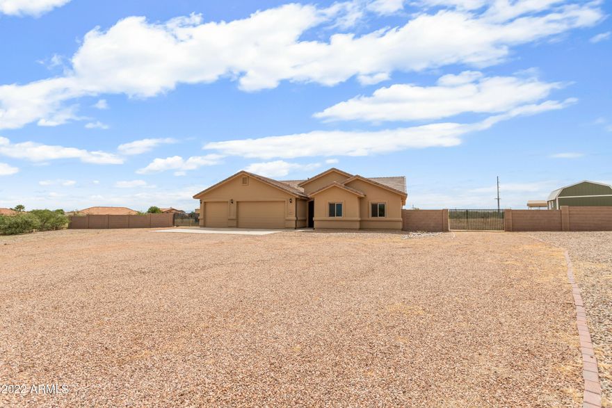 ATTENTION BUYERS- with acceptable offer Seller will credit $10,000 in concessions to buy down buyers interest rate.

This beauty has 4 bedrooms, 3 full bathrooms, 2 living/great rooms and a bonus living or den room off the kitchen. Open concept kitchen has added extended buffet area with matching cabinets, double oven gas range, pot filler and pantry. Primary suite was designed and customized with 2 closets and extra large on-suite with a walk through shower. Other bedrooms in this floor plan are split and 1 of them has it own private bathroom attached with another bathroom in the hall for other rooms and guest. Outside is 2 RV gates with RV hook up, 2 storage sheds - one was used for 'she'' shed, and additional garage/carport storage. Sitting on over 1.8 acres this has it all!