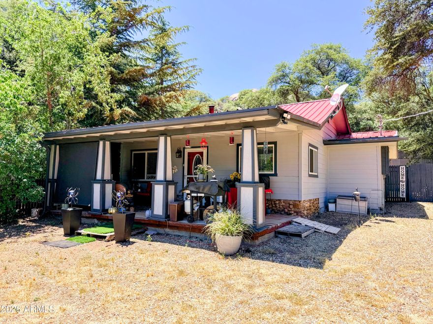 Charming 2 bedroom, 2 bath remodeled cottage nestled in the heart of Yarnell. Situated on a fully fenced .32 acre lot backing to BLM land. Flat property out front & natural boulders out back. Remodeled kitchen, bathrooms and flooring. Updated dual pane windows, tankless water heater, metal roof, fire monitoring system and mini-split system for efficient heating & cooling. One car garage with 220V outlet and private well. Whether you're searching for a full-time residence, weekend getaway or investment opportunity, this unique property captures the tranquility of small-town Arizona living. Enjoy a mild 4-season climate where neighbors care about each other. 100% financing, no down payment & competitive interest rates for qualified borrowers with USDA loan.