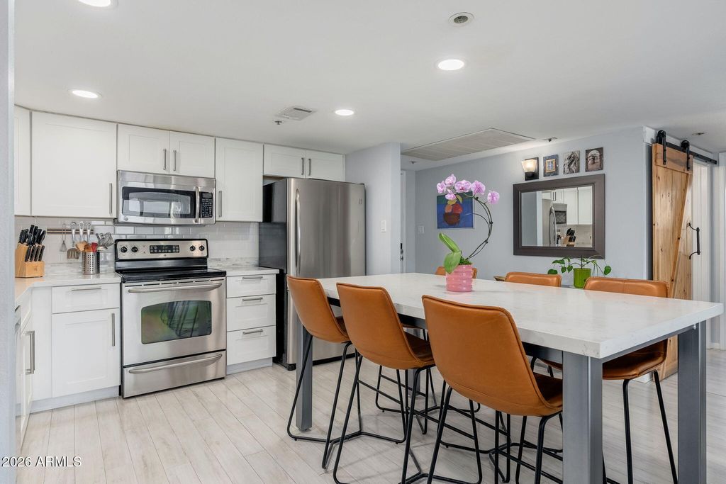 Photo of 7950 E Camelback Road #704, Scottsdale, AZ 85251 (MLS # 7041166)