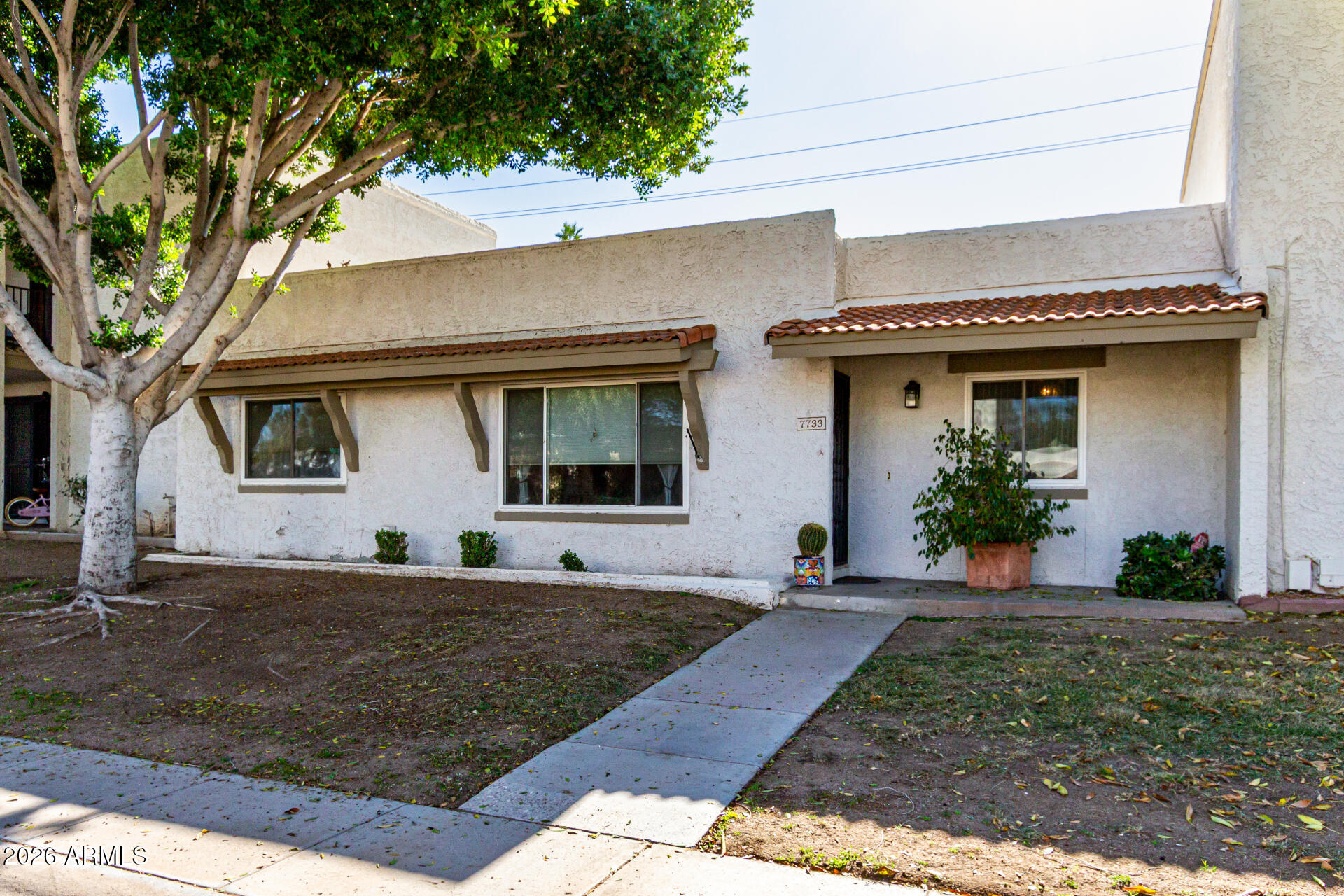 7733 E HARVARD Street