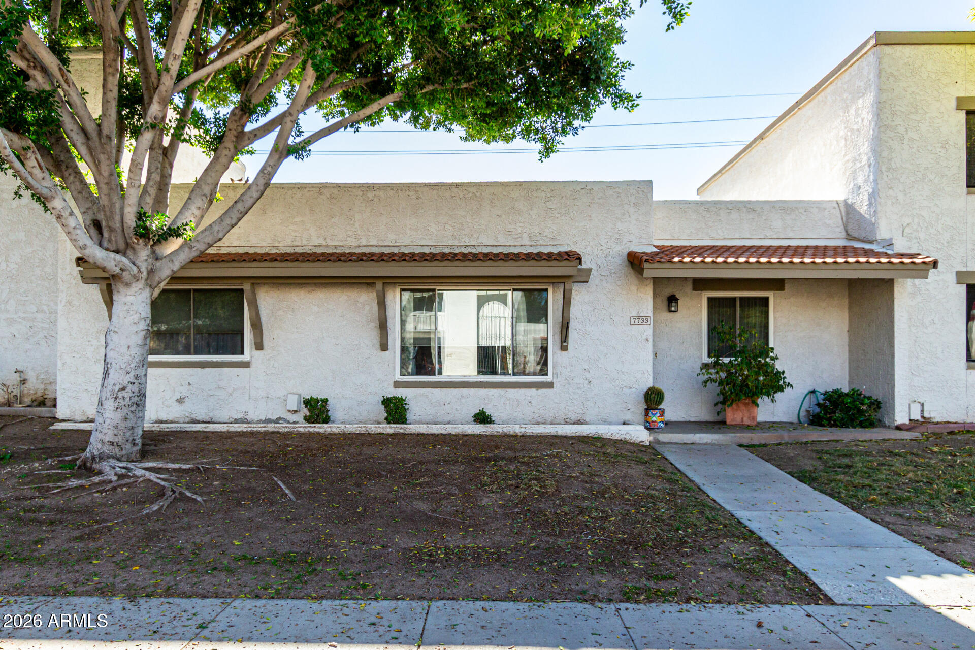 7733 E HARVARD Street