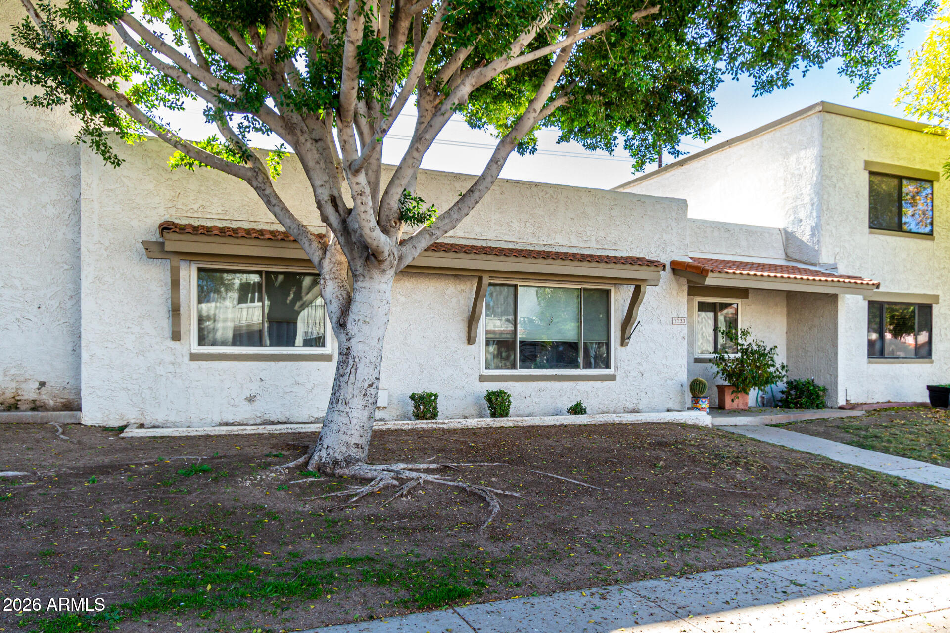 7733 E HARVARD Street