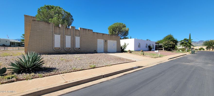 Here is a wonderful opportunity to purchase a great home at a great price. This home is tile throughout making it very easy care. There is a nice living room with a real fireplace, a wonderful breakfast room with a TON of cabinetry as well as a huge family room  with skylights. This home will not last at this price!