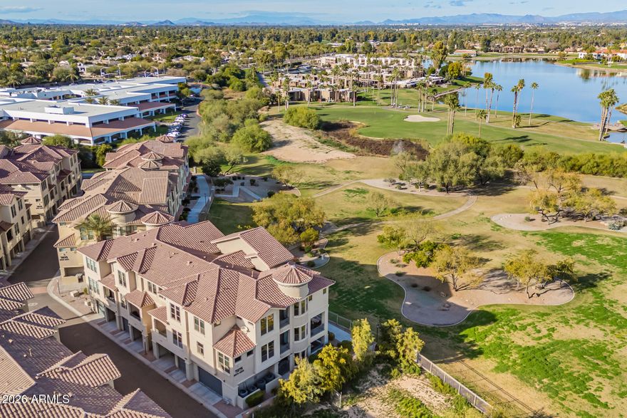 HUGE PRICE DROP! This exceptional three-level residence delivers refined luxury living with unobstructed golf course & mountain views that create a striking sense of openness & privacy. Light-filled interiors are enhanced by travertine flooring, multiple balconies, & a private elevator that provides seamless access to each level. Thoughtfully designed for both everyday comfort & elevated entertaining, the open gourmet kitchen features Viking appliances, gas cooking, a generous island, & designer finishes throughout, all integrated with a Crestron smart home system for effortless control. The flexible floor plan includes four bedrooms & three and a half baths, highlighted by a first-floor guest suite with its own private entrance &full bath—ideal for visitors or multigenerational living. The primary suite is a true retreat, offering blackout shades, a private balcony, dual closets, and distinctive custom leather flooring. A two-car garage with EV charging adds modern convenience, while gated front door access and a secure community setting provide peace of mind. Located within the prestigious Artesia community, residents enjoy access to a resort-style pool, spa, fitness center, ramadas, and a sprawling ten-acre park adjacent to McCormick Ranch Golf Club. The setting is unmatched, with McCormick Train Park just across the street and the ability to walk to dining and shopping. Perfectly positioned in the heart of Paradise Valley and Scottsdale, this home offers immediate access to freeways, premier shopping, renowned restaurants, and year-round eventsan extraordinary opportunity to experience luxury living in one of the area's most coveted locations.