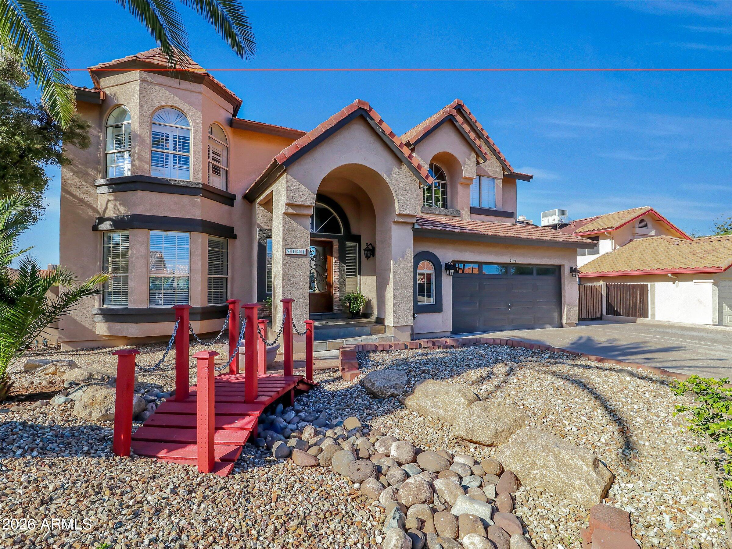 7121 W Windrose Drive