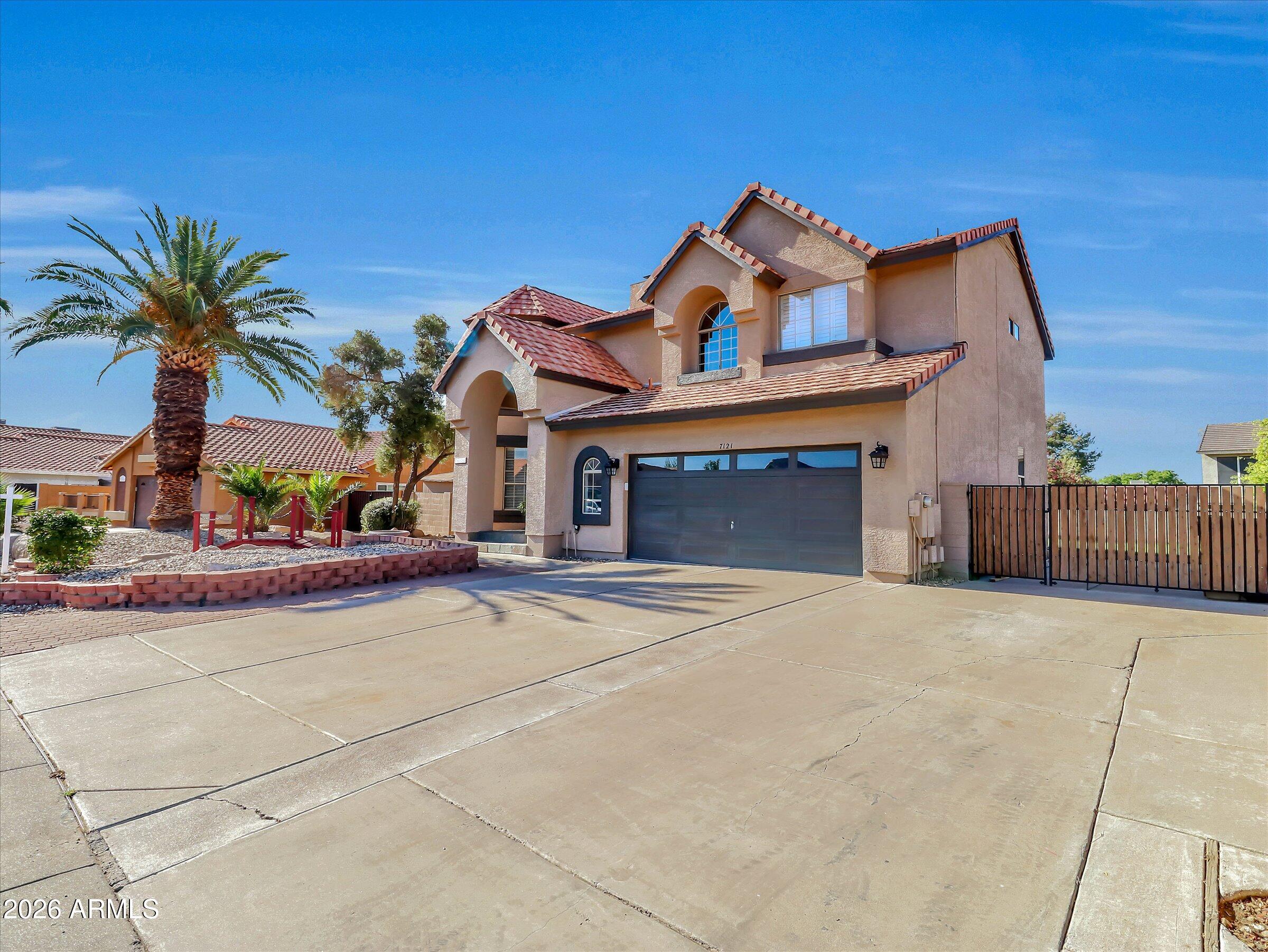 7121 W Windrose Drive