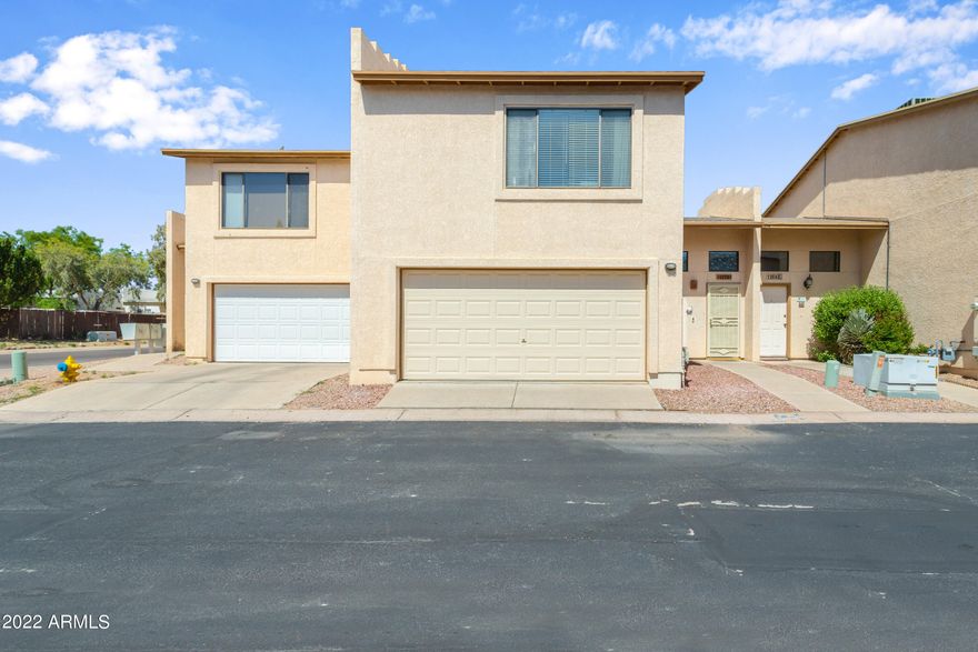 Centrally located 2 story townhome with 3 bedrooms and 2 bathrooms. Large living room dining combo . Kitchen is separate from the living space. Backyard is fully fenced with block wall and turf covers the complete area besides your great spacious covered patio. 
This home is waiting for you why don't you call today to see it for yourself.