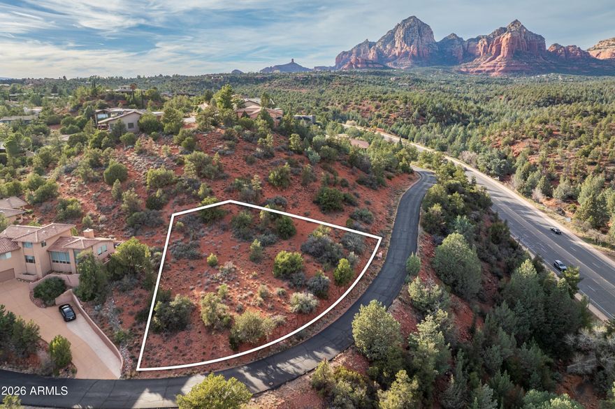 VIEWS, VIEWS, VIEWS. Stunning elevated hillside lot in the highly sought-after Rolling Hills Estates in West Sedona, offering breathtaking panoramic views of the iconic Red Rocks. Survey available. This beautiful property sits high above surrounding homes, providing exceptional wide-open vistas and an ideal setting for a custom luxury residence. No timeline to build, allowing you to purchase now and build at your convenience. Low annual HOA dues. Within approximately 250 yards of the National Forest trail system and within walking distance to nearby restaurants, grocery stores and shops. An incredible opportunity to secure a premium view lot in a prime Sedona location. Two lots (82/83) available: (Lot 83) 210 Barcelona is offered at $225,000. (Lot 82) 230 Barcelona is offered at $195,000.