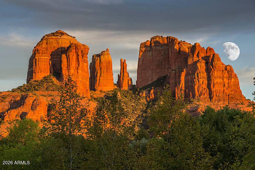 Panoramic Cathedral Rock View Lot in Coveted Mystic Heights. Bring your architectural vision to one of Sedona's most exclusive gated enclaves. This premium home site in Mystic Heights offers the ultimate canvas for a custom luxury estate, boasting soaring, unobstructed Red Rock views. Wake up to perfectly framed, iconic vistas of Cathedral Rock from your future master suite.The property features a gentle slope. Enjoy total seclusion and unmatched privacy, while staying just minutes from the waters of Oak Creek, world-class hiking trails, and two stunning State Parks. Land in Sedona is finite--do not miss this rare opportunity to own a private slice of heaven among the red rocks.