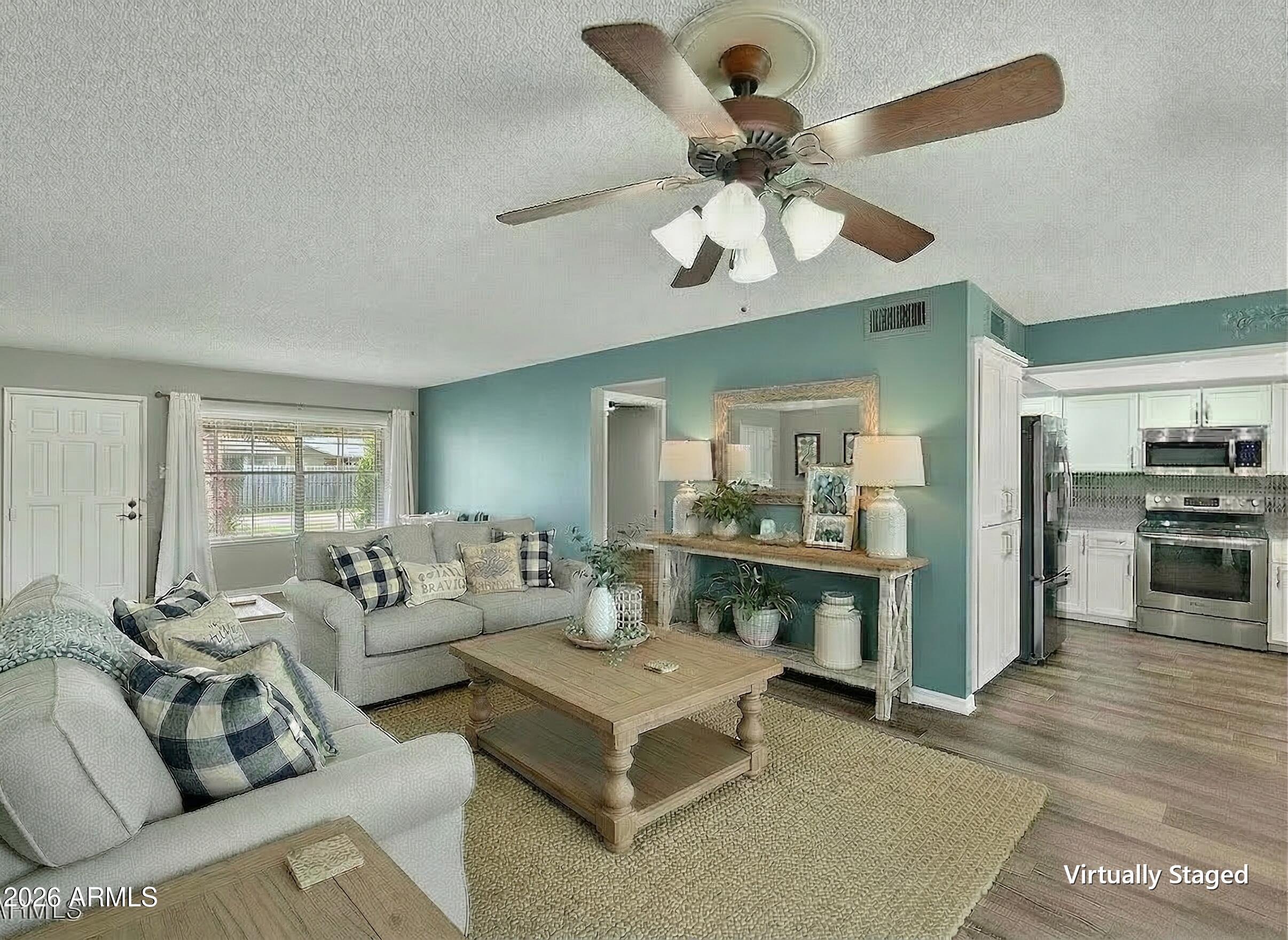 7711 E DESERT FLOWER Avenue