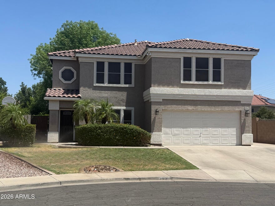 Opportunities like this rarely come available in east Mesa. This beautifully updated 4-bedroom home sits at the end of a quiet cul-de-sac on a rare oversized 0.28-acre lot in Boulder Creek Subdivision, directly adjacent to a community park--offering space, privacy, and a setting that families truly value.
With 2,757 square feet, this home features a highly functional layout designed for both everyday living and gathering. Enjoy a formal living room, a spacious family room, and an open kitchen great room that naturally brings everyone together. Upstairs includes four bedrooms, two full baths, loft, an enclosed TV room and a flexible office space--perfect for growing families, remote work, or multi-use living.
A major renovation in 2017 brought extensive upgrades, including new granite kit A major renovation in 2017 brought extensive upgrades, including new granite kitchen
countertops, updated flooring throughout (tile and carpet), and a fully refreshed pool with new
pump/filter. Additional improvements include a full roof tile R&R (2019), new HVAC system
(2020), and a large covered patio added in 2021 that spans the back of the home--creating a
seamless indoor-outdoor lifestyle.
The backyard is where this home truly shines. Designed for both relaxation and fun, it features a
private fenced 16x32 pool, basketball court, mini-golf course, and a fully landscaped grass
yard--an ideal space for kids, entertaining, or simply enjoying Arizona evenings. A 12x16 fully
finished air conditioned workshop (2018) offers additional flexibility for hobbies, storage, or
creative space. The property also includes an RV gate and additional side parking.
Inside, you'll find 9' ceilings downstairs, crown molding throughout, window trim on all windows,
and a huge walk-in pantry--details that add both comfort and character. A 2-car garage
completes the home.
Owned solar panels help reduce energy costs, whole-house water softener, reverse-osmosis
drinking water.
Located just 1 mile from the Loop 202 freeway, this home offers convenient access to shopping,
dining, and commuting routes while still maintaining a quiet, neighborhood feel.