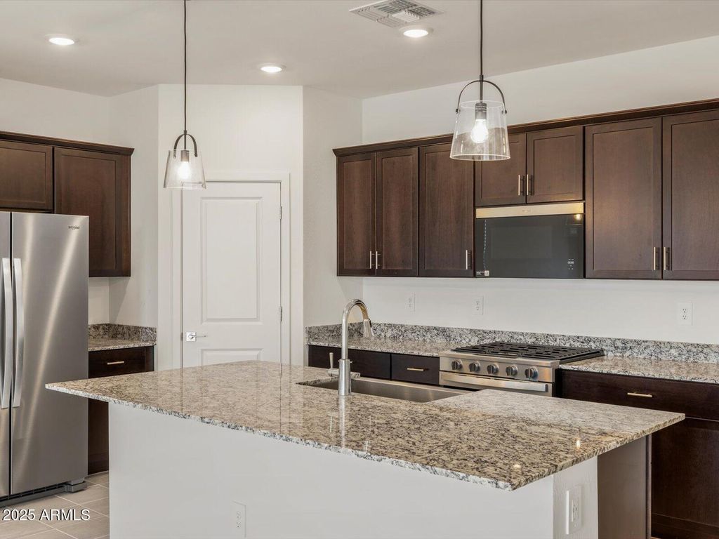 Photo of 12728 N 305th Avenue, Buckeye, AZ 85396 (MLS # 6952441)