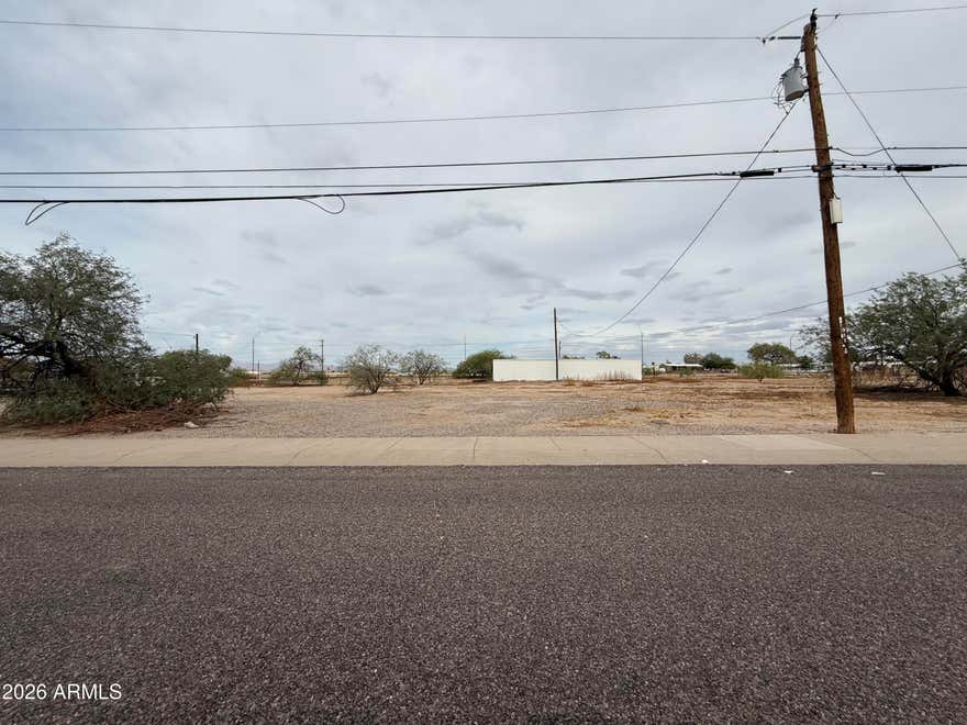 19,358 square foot corner lot. Additional surrounding parcels also for sale. Please inquire on a potential package deal. All utilities to the lot. The contiguous parcel is zoned commercial with Hwy frontage offering possible re-zoning and development opportunities.