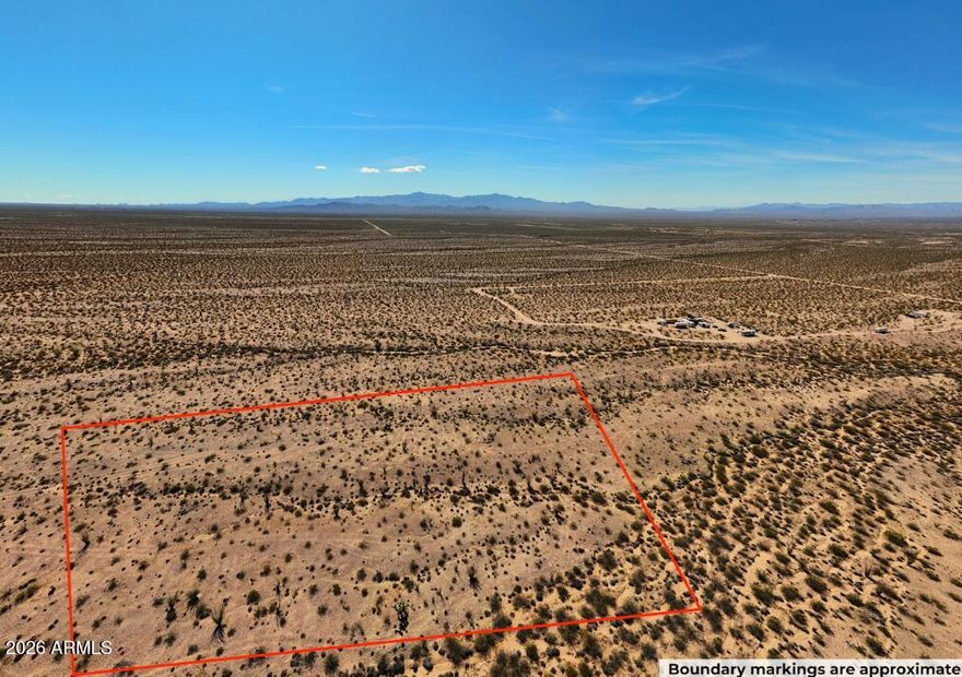 Great opportunity to own 5 acres in Lake Havasu Ranchos! Enjoy beautiful mountain views and natural desert vegetation with plenty of space for your vision. Located just 10 minutes off the paved highway for easy access while still offering privacy and peace. Build your dream home, or place a manufactured home--flexibility to suit your needs. Owner will carry!