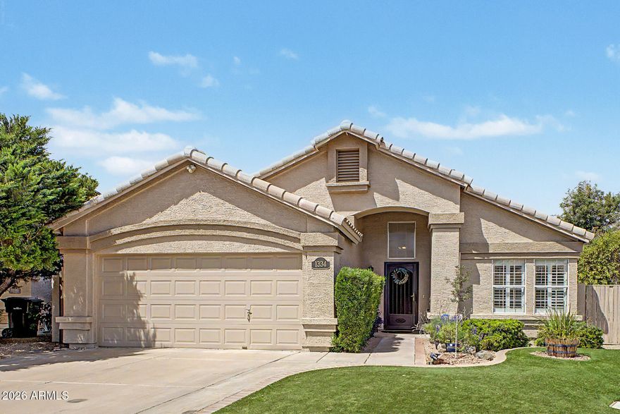 Highly sought after Val Vista Lakes home! This newly updated, 3 bed, 2 bath home will not last long!! Beautifully updated primary bathroom & secondary bathroom. Office off of the entry as well. Comes with brand new stainless kitchen appliances, new wood flooring throughout & new carpet. Ready for a quick move in!!!
