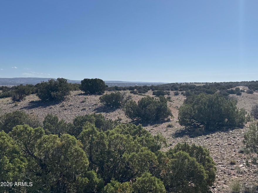 36.25 acres of beautiful off-grid land in Woodland Valley Ranch! Peaceful, quiet setting with fabulous views and a mild four-season climate -- temperatures rarely exceed 100°, average around 45° in January, and snowfall is minimal at approximately 20'' annually. Roads are maintained by the POA with very few restrictions. Camp, build your dream home or cabin, or enjoy full-time RV living. The adjacent parcel is also available at the same price, creating a rare opportunity to own two side-by-side properties together. Escape the crowds and enjoy wide-open space, privacy, and endless possibilities! Seller financing available.