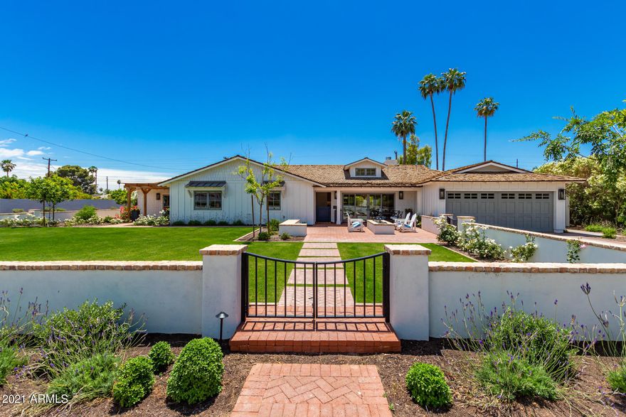 Stunning Arcadia entertainers dream with ideal N/S Camelback views on large corner, cul-de-sac lot. Light and bright open concept kitchen with expansive 9' island.  Sub-Zero/Wolf appliances with 36'' range, paneled  refrigerator & freezer, & wine fridge. Walk-in pantry and butlers pantry serves as wet kitchen featuring storage, extra fridge, & sink. 4 bedrooms with en suite bathrooms, large media room , plus den. Over sized 2 car garage with storage, entrance features a key drop area & and built in lockers.
