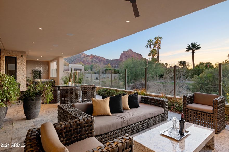 Experience luxurious Resort style living at Mountain Shadows Villas in this beautiful single level home situated on the 18th tee box of the golf course with exceptional views of Camelback Mountain and sunsets! Low maintenance lock & leave living with high end finishes throughout, this home offers everything you are looking for. A great room floor plan featuring 10ft ceilings and accordion doors opening to the expansive covered patio with gas fireplace & above ground spa, this is true Arizona paradise with indoor/outdoor living perfect for entertaining or relaxing in your private oasis. A private gate from your patio leads you on to the golf course and a short walk to enjoy the finest amenities at Mountain Shadows Resort, including a state-of-the-art pool and spa, exercise facility or any of their many dining options. Premium location in Paradise Valley near fine dining, shopping, the airport and the best entertainment offerings in The Valley.

Paradise Valley, Arizona, is a charming town renowned for its exclusive estates, luxury resorts, and stunning desert vistas, framed by Camelback Mountain and Mummy Mountain. Just minutes from Phoenix, the town offers a refined lifestyle with opulent homes, upscale retreats, golf courses, and spa resorts. Strict zoning regulations underscore Paradise Valley's commitment to preserving its natural beauty, creating a harmonious blend of sophistication and the Sonoran Desert environment. This idyllic oasis stands as a testament to the town's unique fusion of luxury living and breathtaking landscapes.