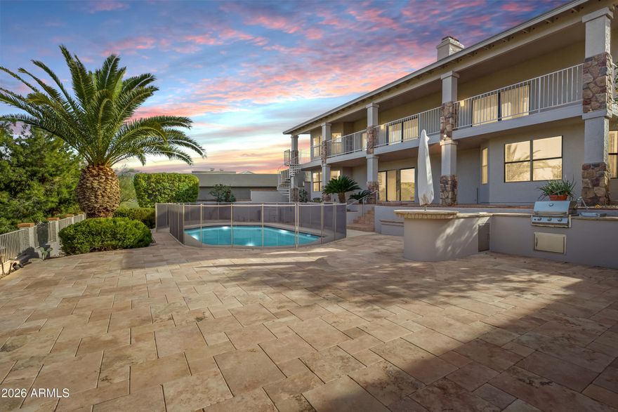 Panoramic views that carry from room to room and patio to covered deck. All the costly areas are remodeled and updated. Ever bedroom has direct access to a bathroom with 4 of each and really a double master setup with two distinct living rooms, each with its own fireplace. This is the kind of floor plan that provides comfortable living for everyone. You'll also appreciate the expansive backyard and remodeled pool. The grill island and bar make outdoor entertaining easy. You'll also find the deck to be deep enough and more than comfortable to relax undercover instead of the rarely used rooftop options you see elsewhere. New exterior paint 2026. Refrigerator, washer and dryer included.