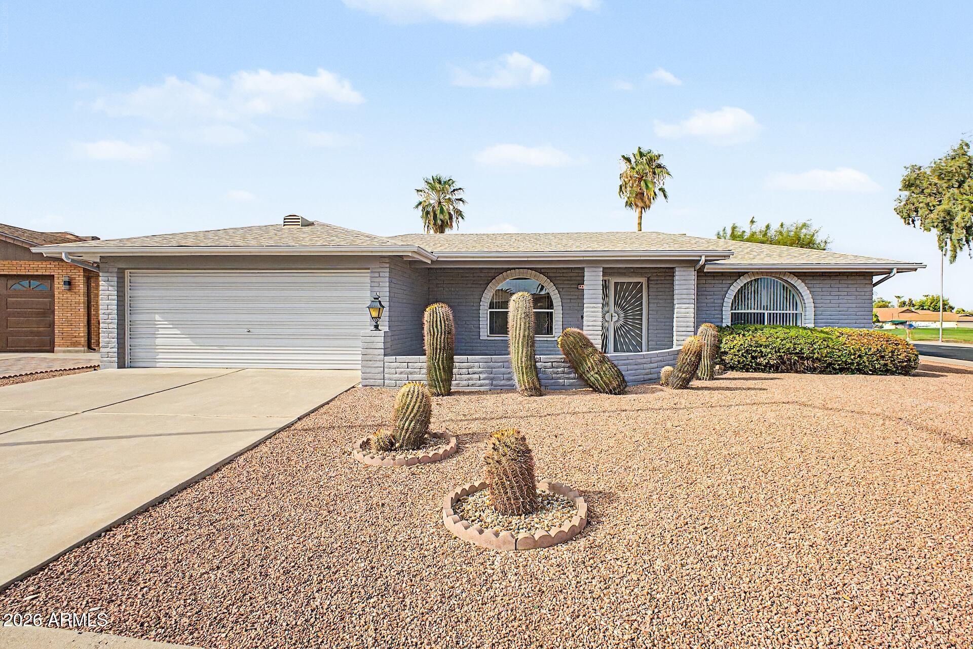7803 E KIOWA Avenue