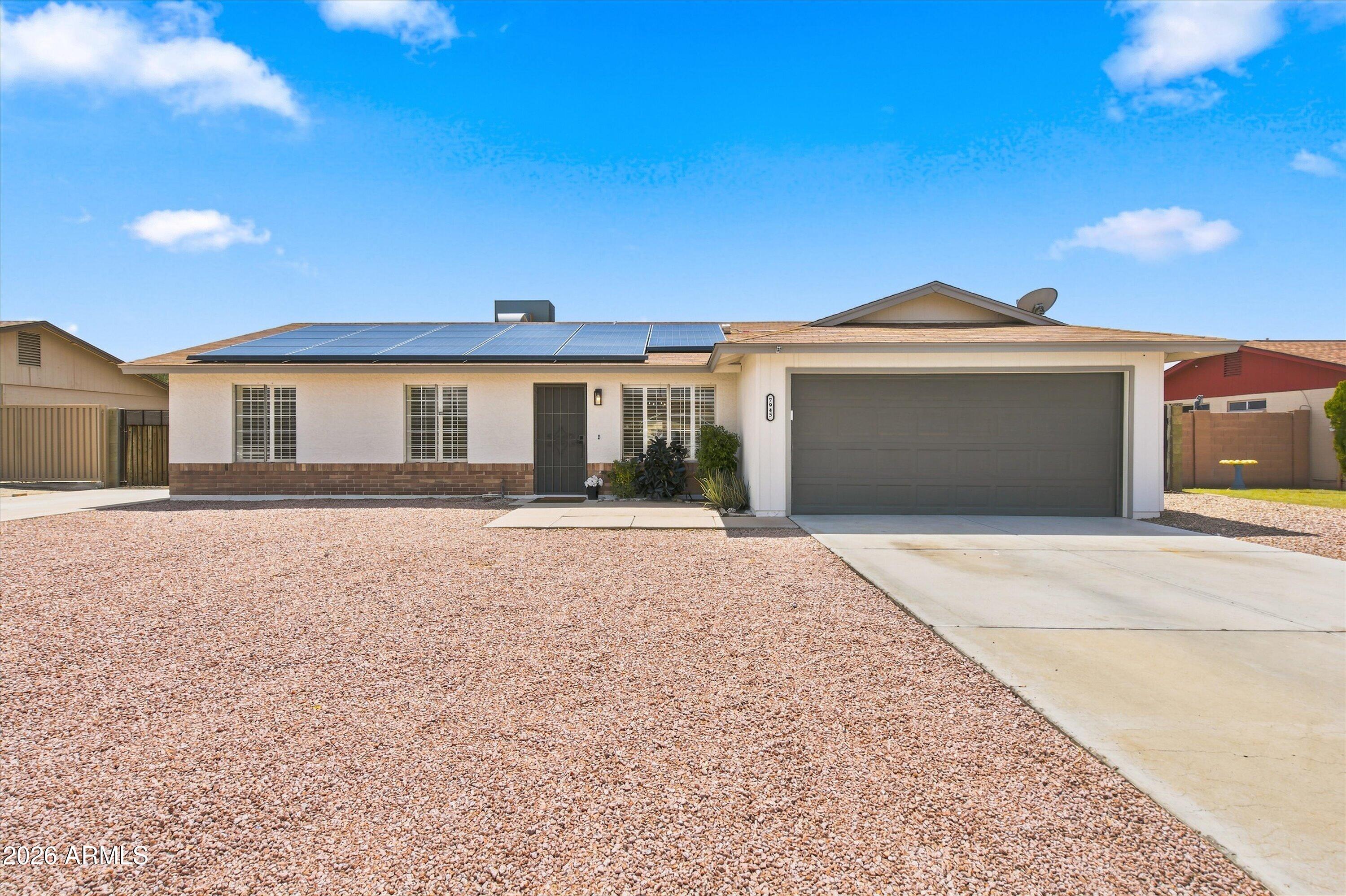 7945 W GREER Avenue