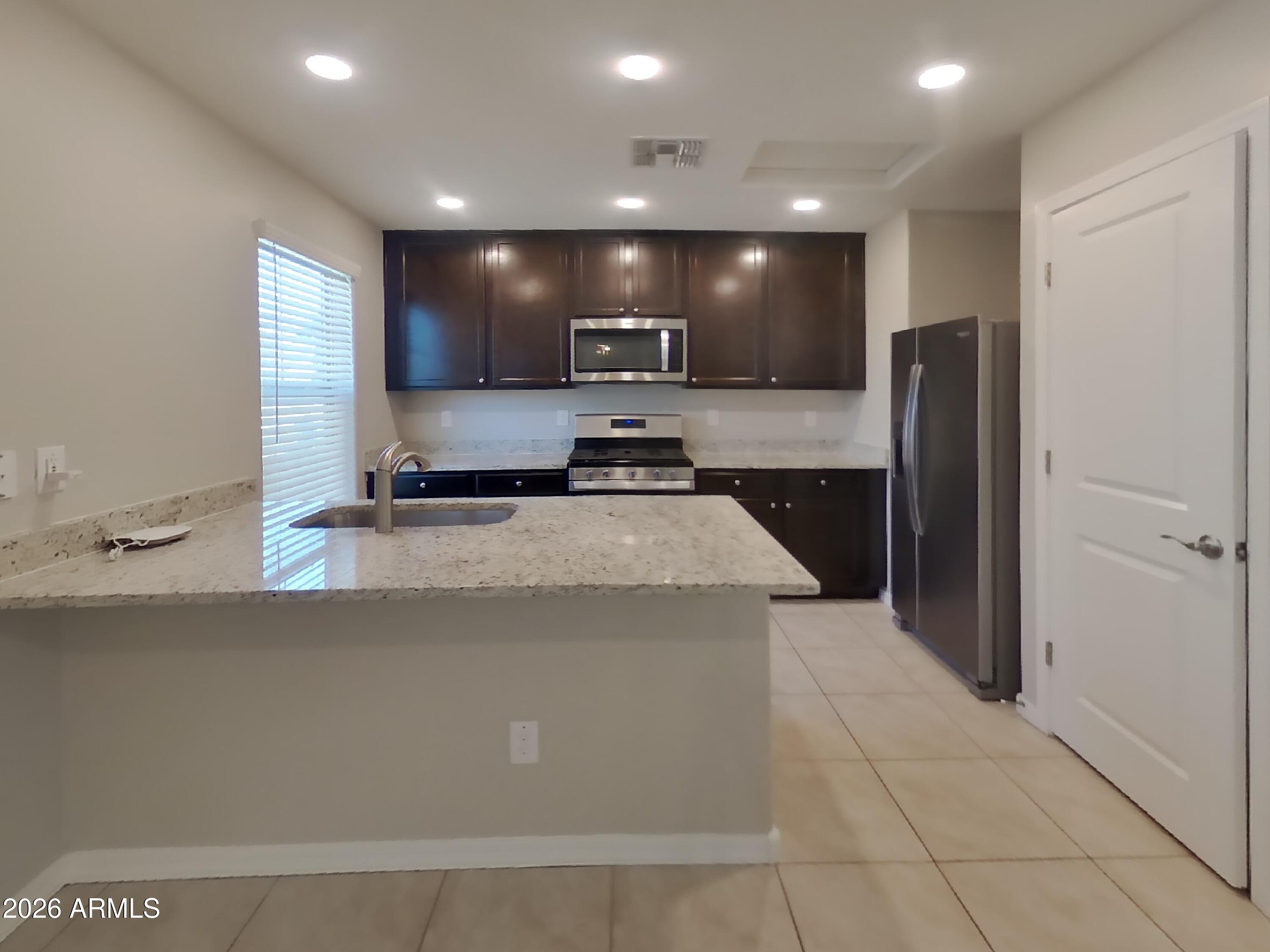 8023 W ALBENIZ Place